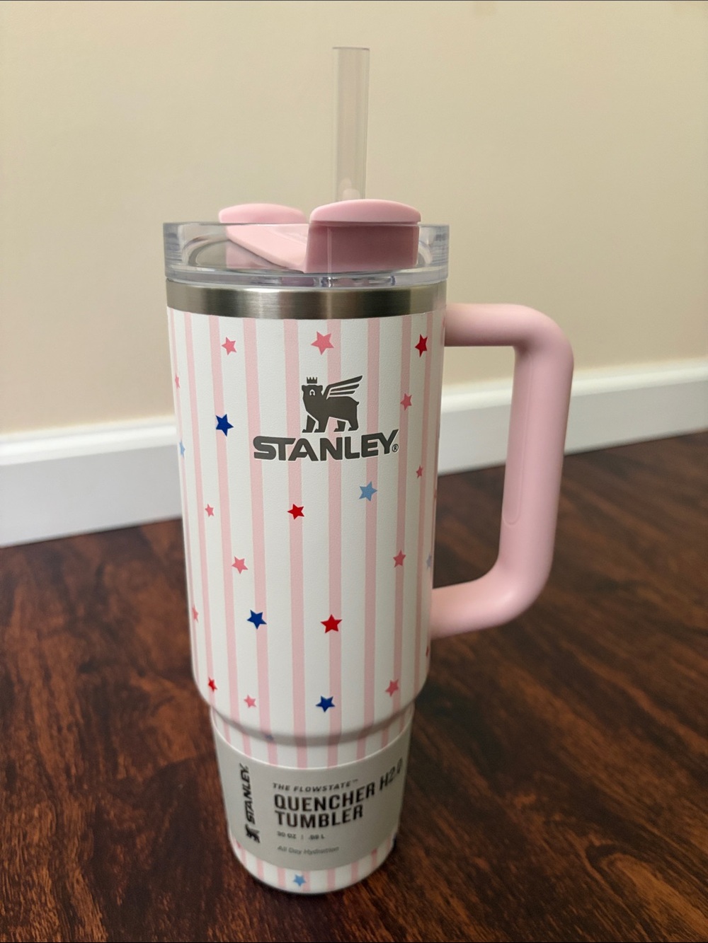 Pink and White Striped Stanley Cup with Red and Blue Stars